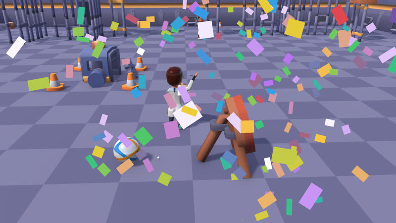 A scientist cheers as confetti rains on the target